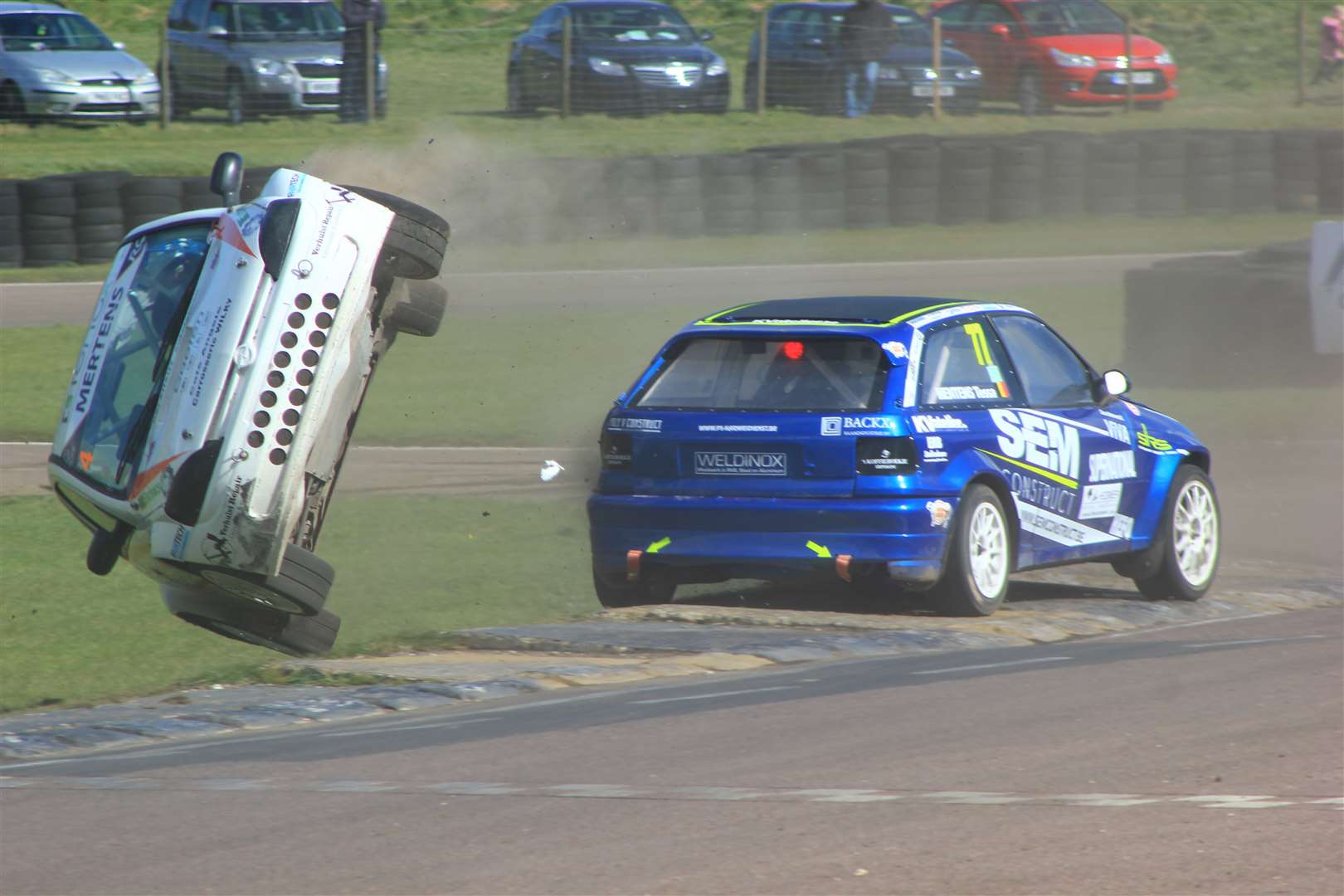 Belgian driver Jef Mertens (Opel Corsa) had a dramatic roll after contact with Tessa Mentens. Picture: Joe Wright