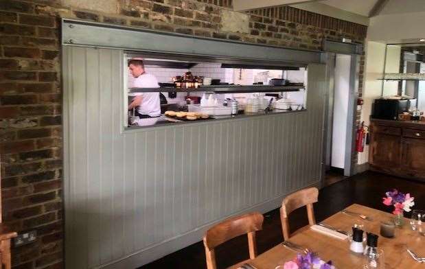 The kitchen, as you can see through the window, was still in action but we had passed closing time so had to settle for crisps