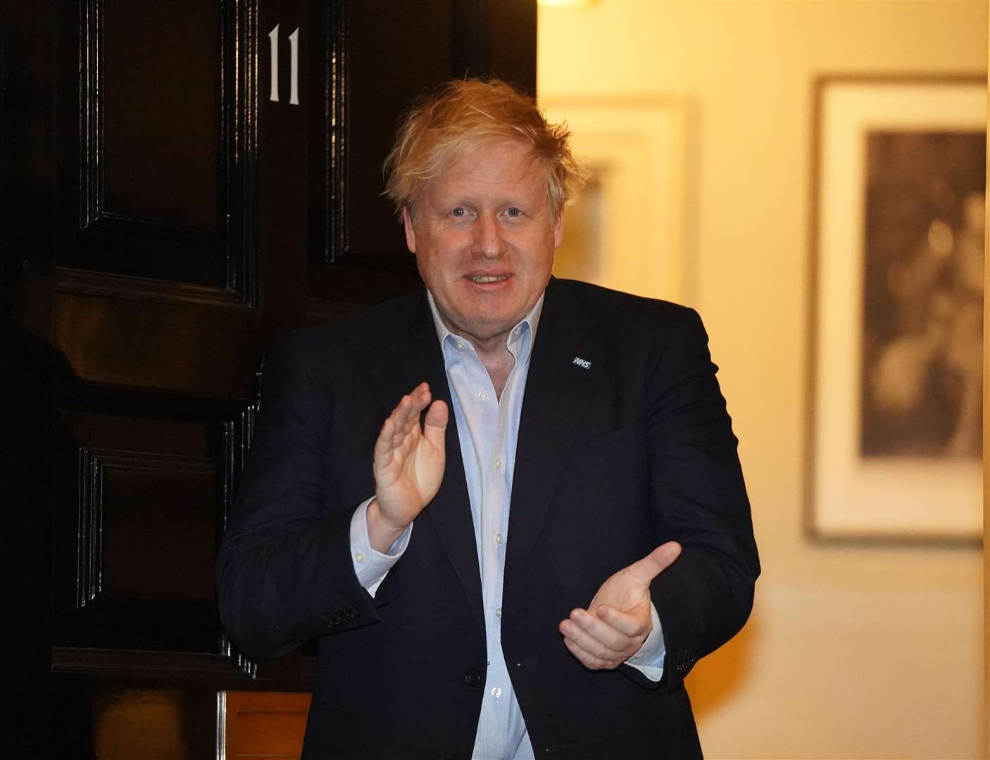 Prime Minister Boris Johnson clapping outside 11 Downing Street in his first public appearance since he was diagnosed with Covid-19 (Pippa Fowles/Crown Copyright/Downing Street/PA)