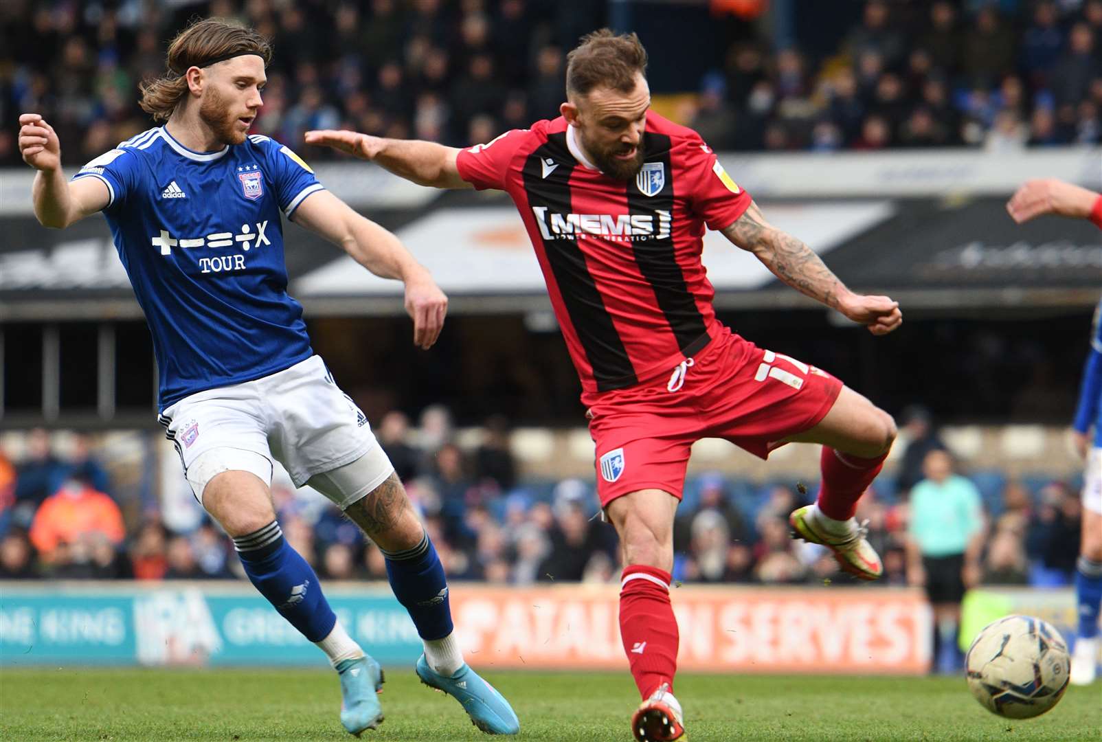 Wes Burns of Ipswich and Danny Lloyd of Gillingham contest possession. Picture: Barry Goodwin