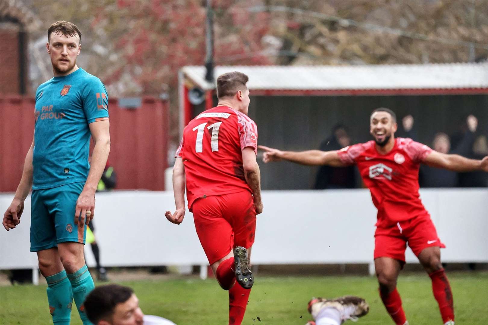 Jake Embery (No.11) celebrates after giving Hythe the lead. Picture: Helen Cooper