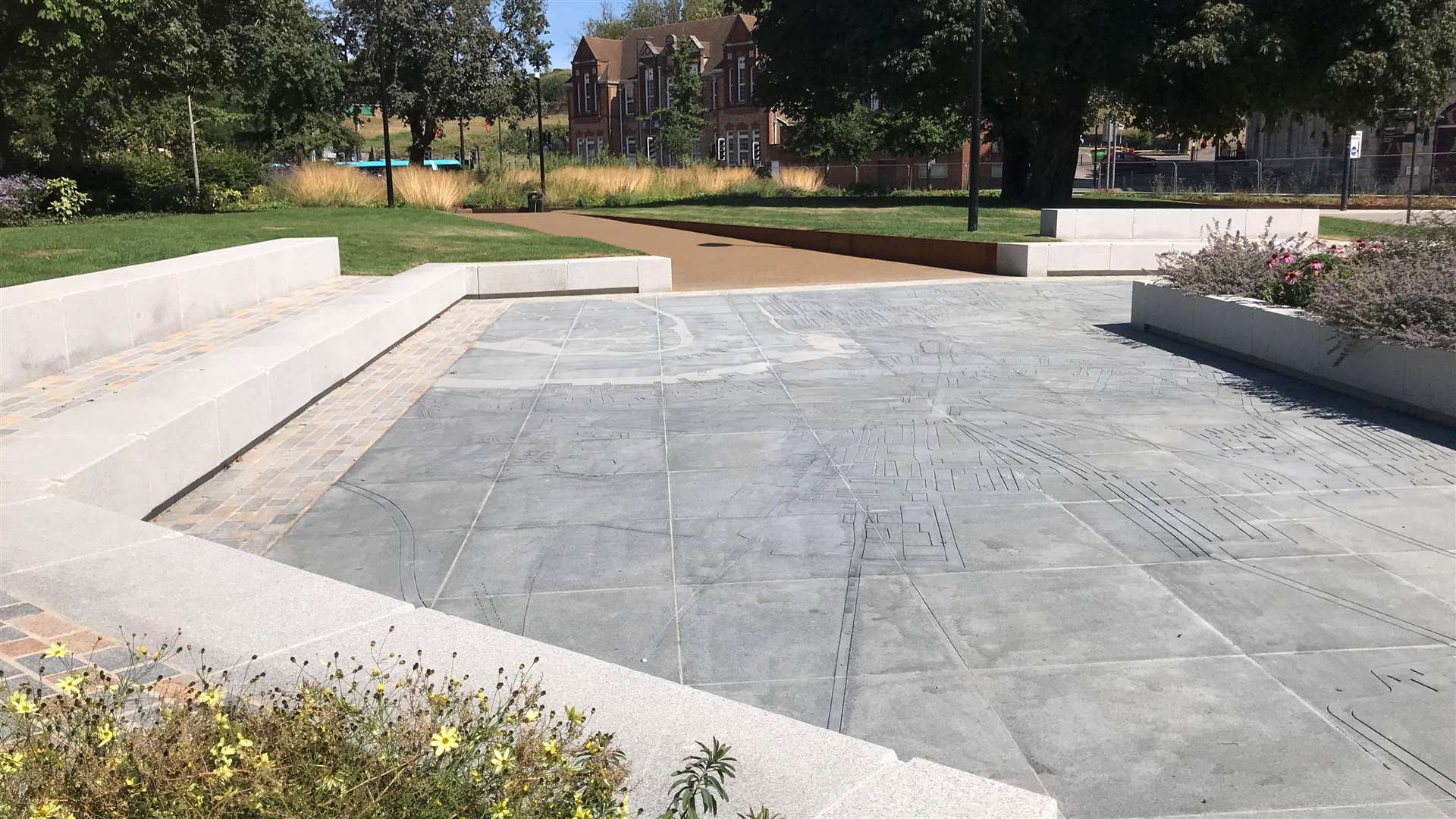 The paved space has a carving of a 19th century map of Chatham