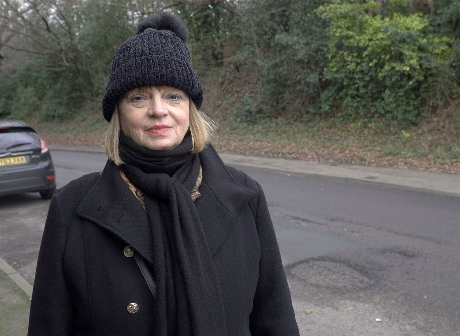 Councillor Sue Ferguson is calling for KCC to fix the potholes in Beacon Oak Road