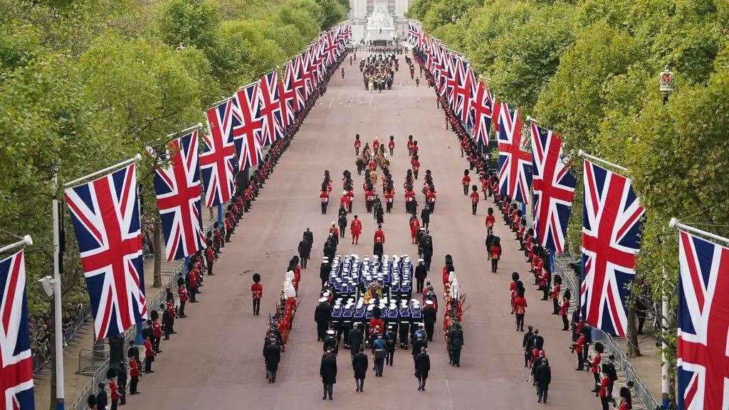 The Queen's coffin is escorted down the Mall. Photo: Ian West/PA