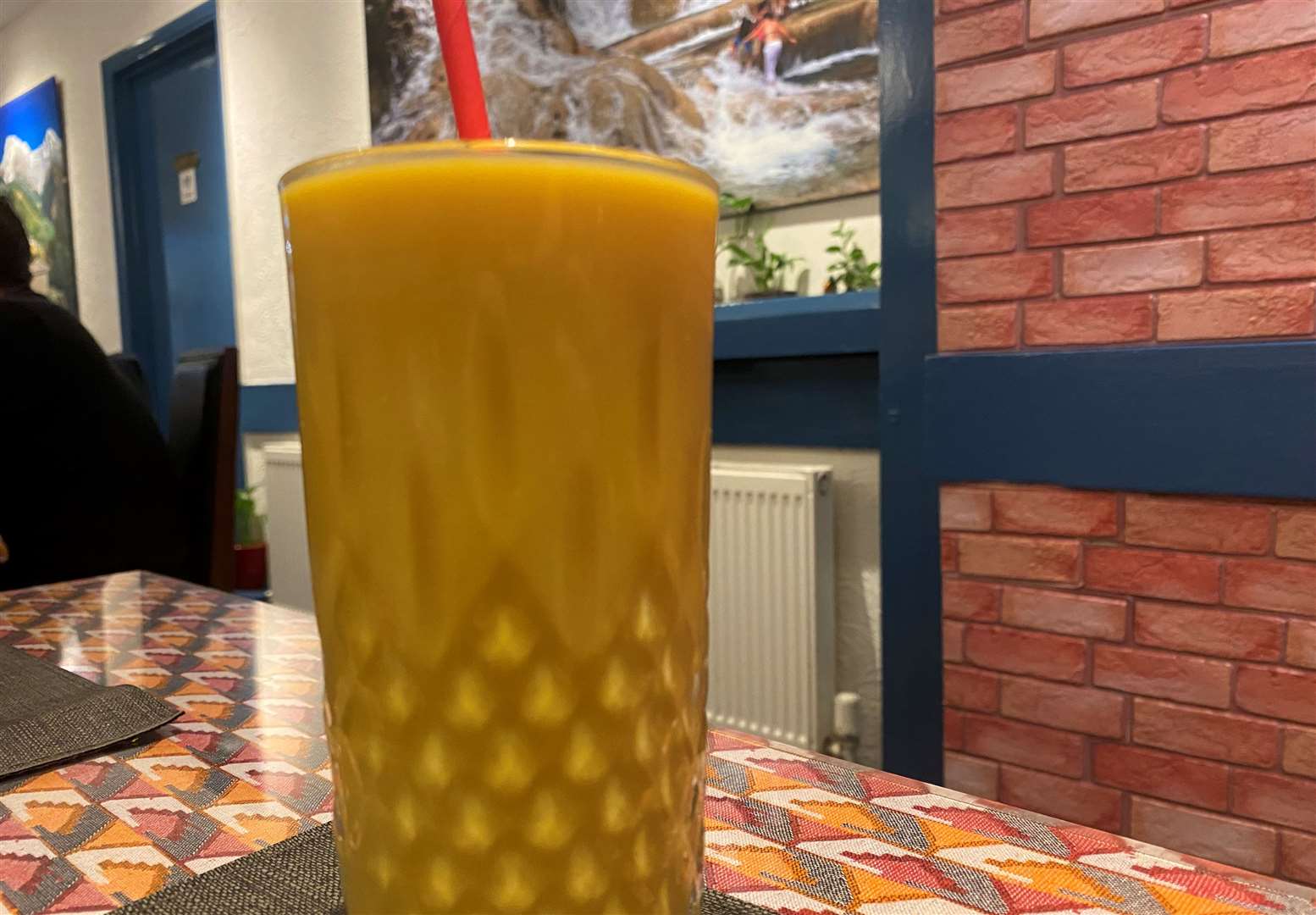 The mango lassi was a delicious end to the meal