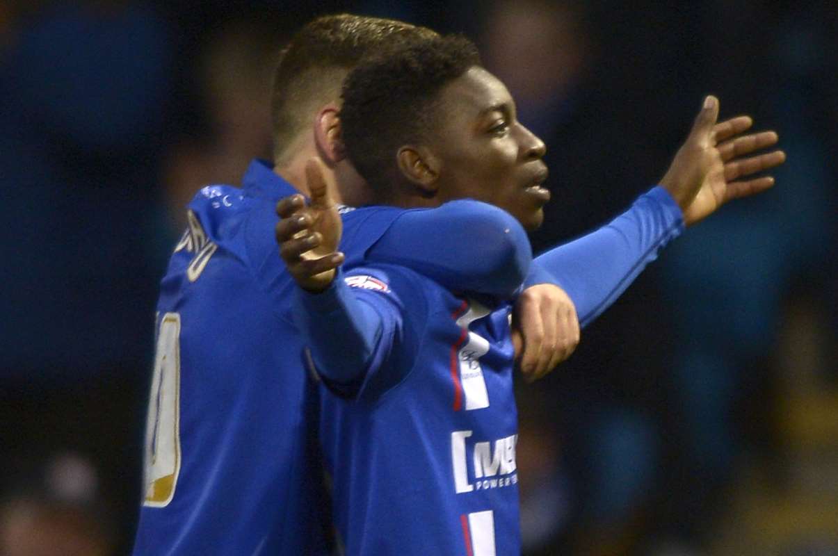 Jermaine McGlashan celebrates his 86th-minute strike for Gills against Sheffield United Picture: Barry Goodwin