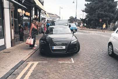 A badly parked car in Harbour Street