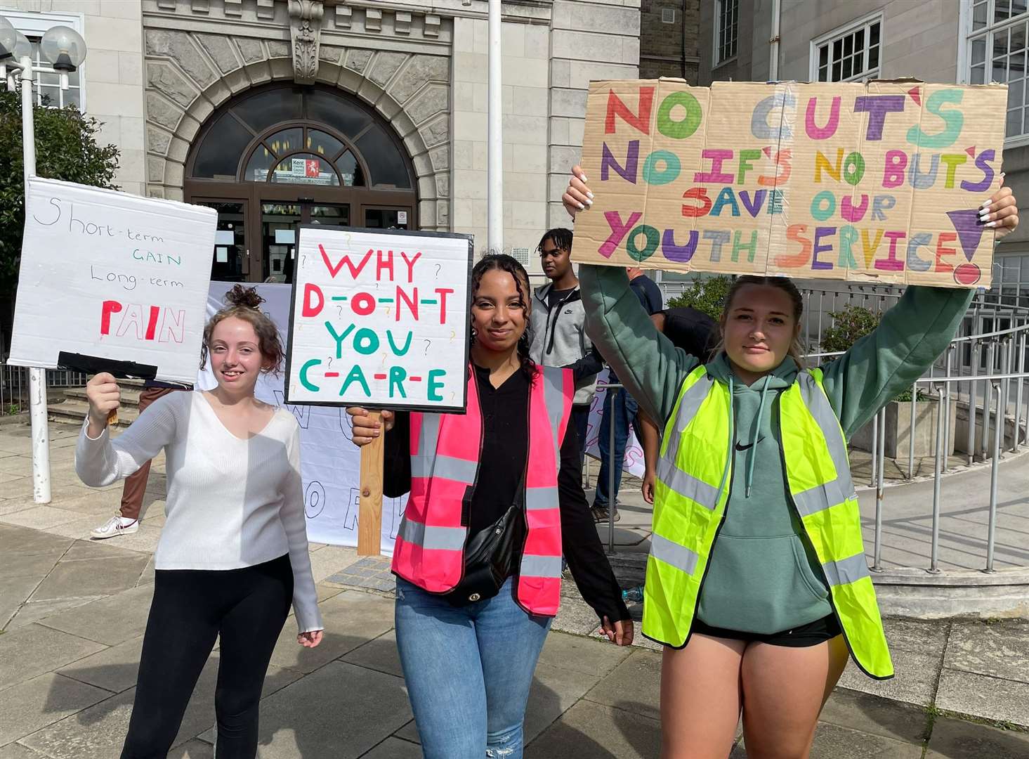 Youth groups are protesting outside County Hall in Maidstone over proposed cuts