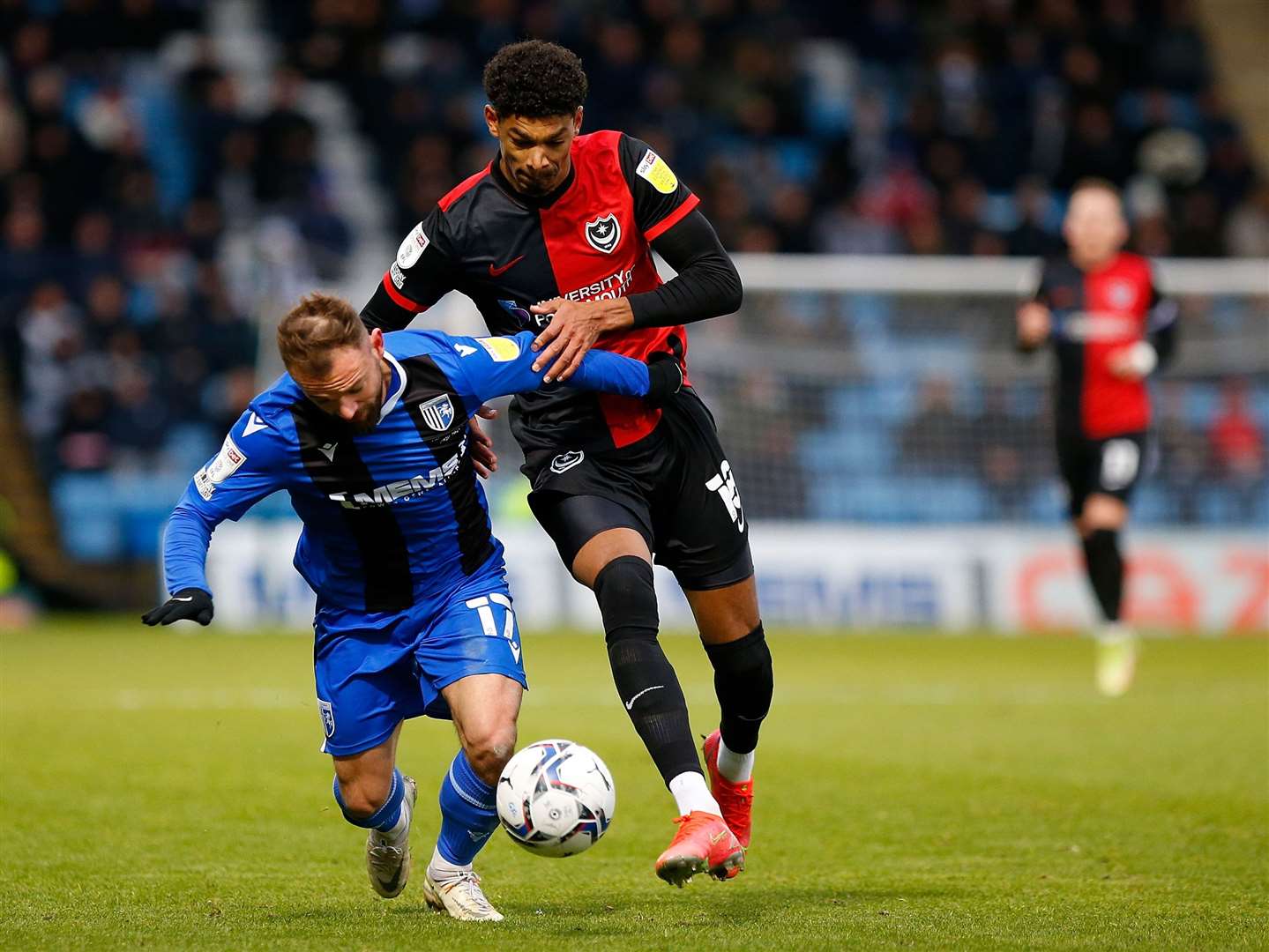 Danny Lloyd takes a tumble as Gills push forward. Picture: Andy Jones