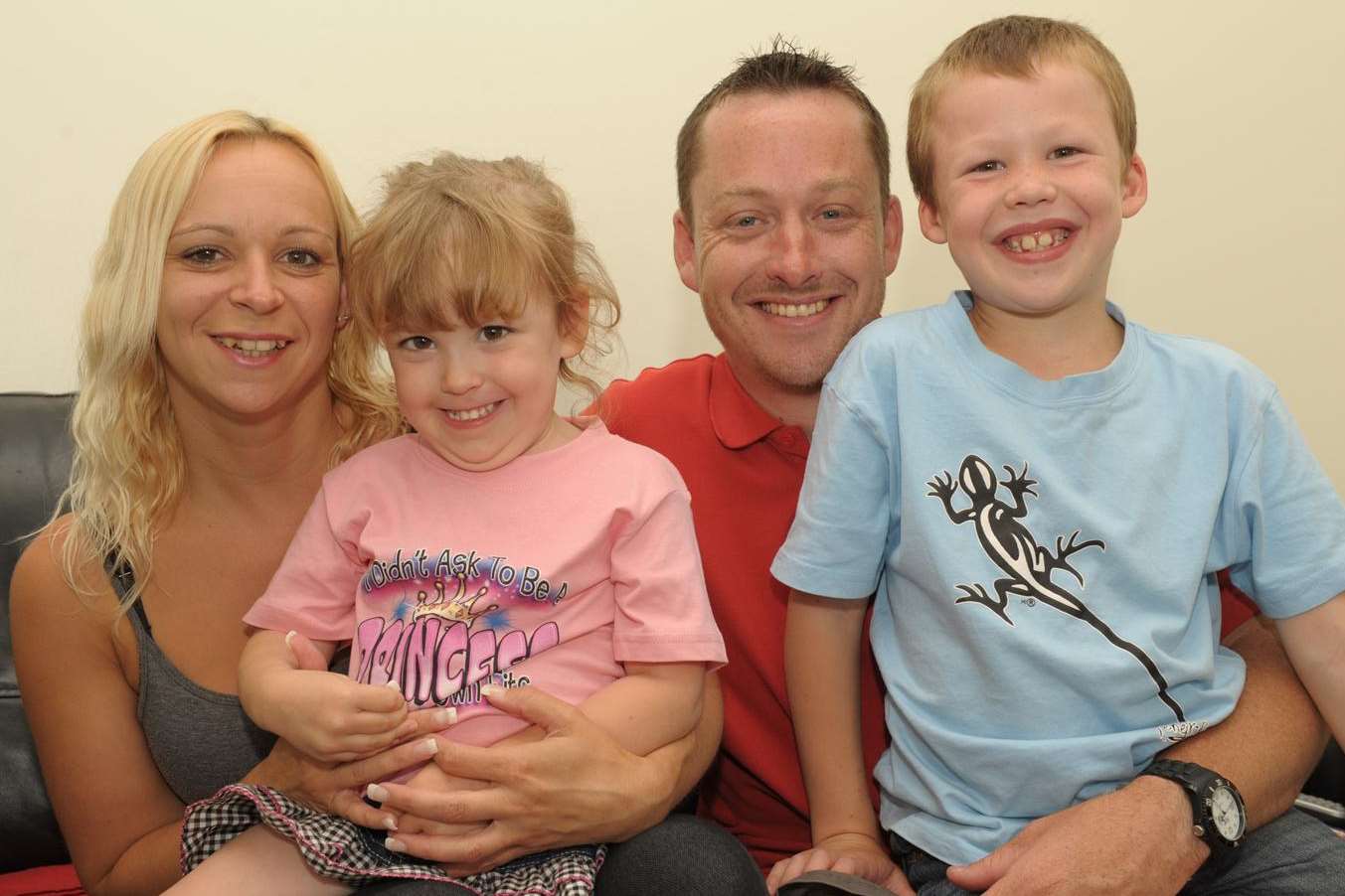 Paige with parents Julie and David and brother Craig.