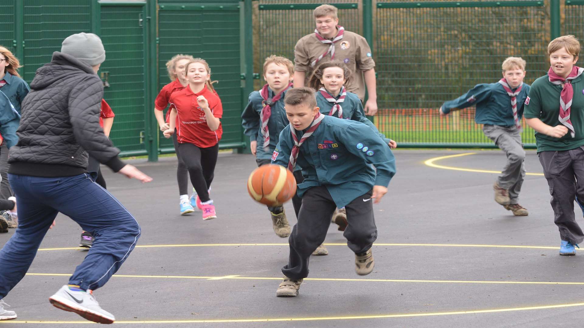 1st Shadoxhurst scouts and pupils from Kingsnorth Primary School try out the new multi use games area at Kingsnorth playing field.