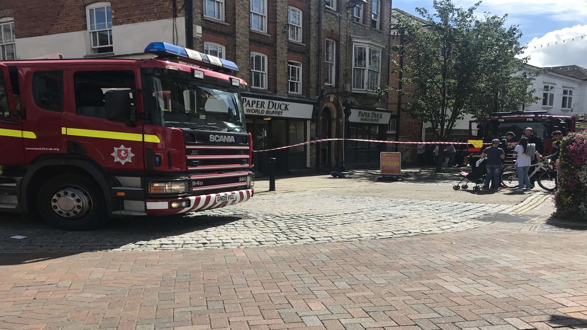 Crowds gather as fire crews tackle the blaze