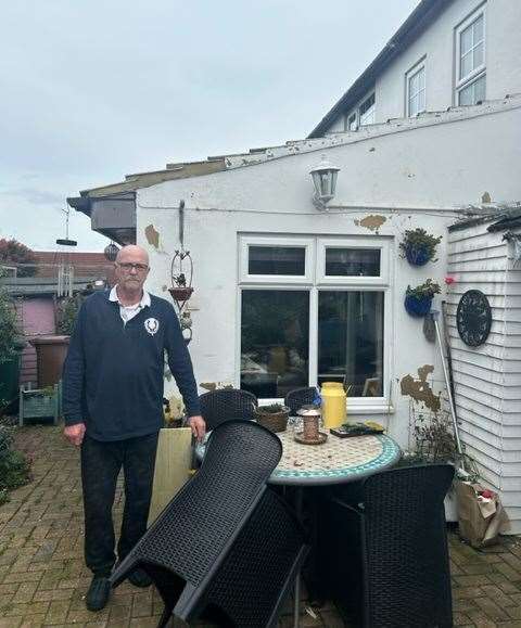 Tom Duffy outside his summer house