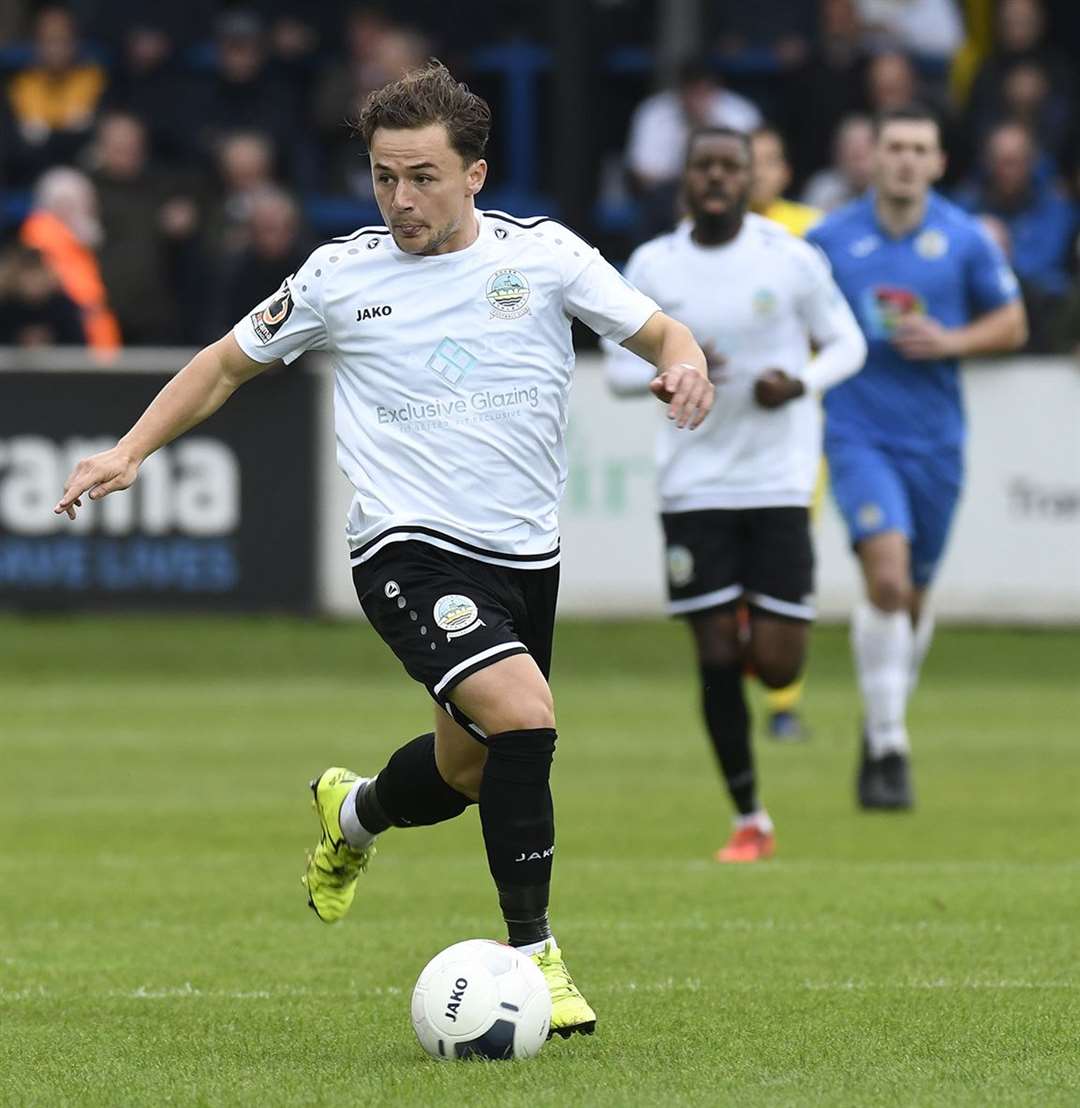 Dover's Jack Munns pushes forward against Stockport Picture: Tony Flashman