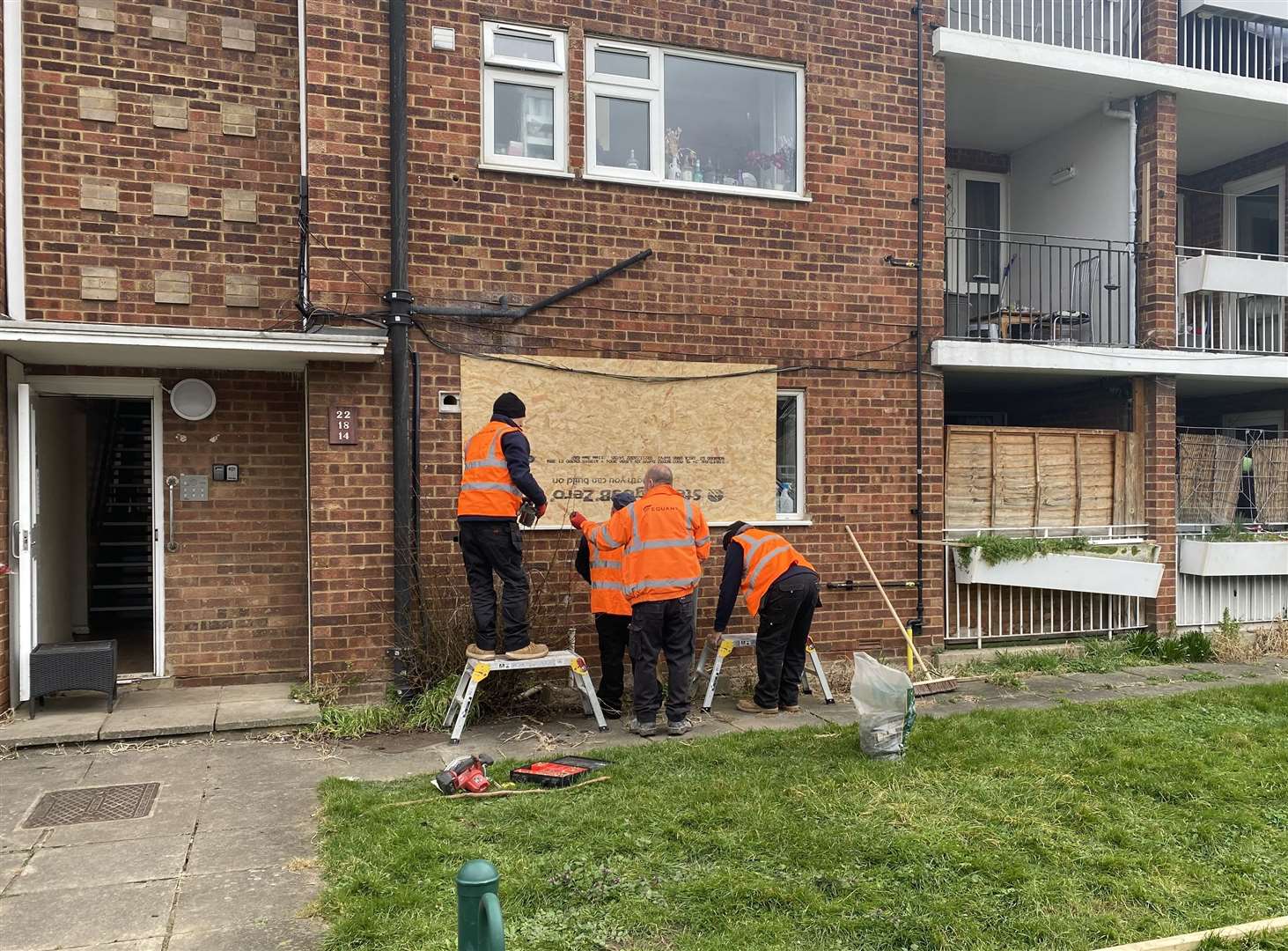 The window of the ground-floor flat has been boarded up in Catlyn Close, East Malling