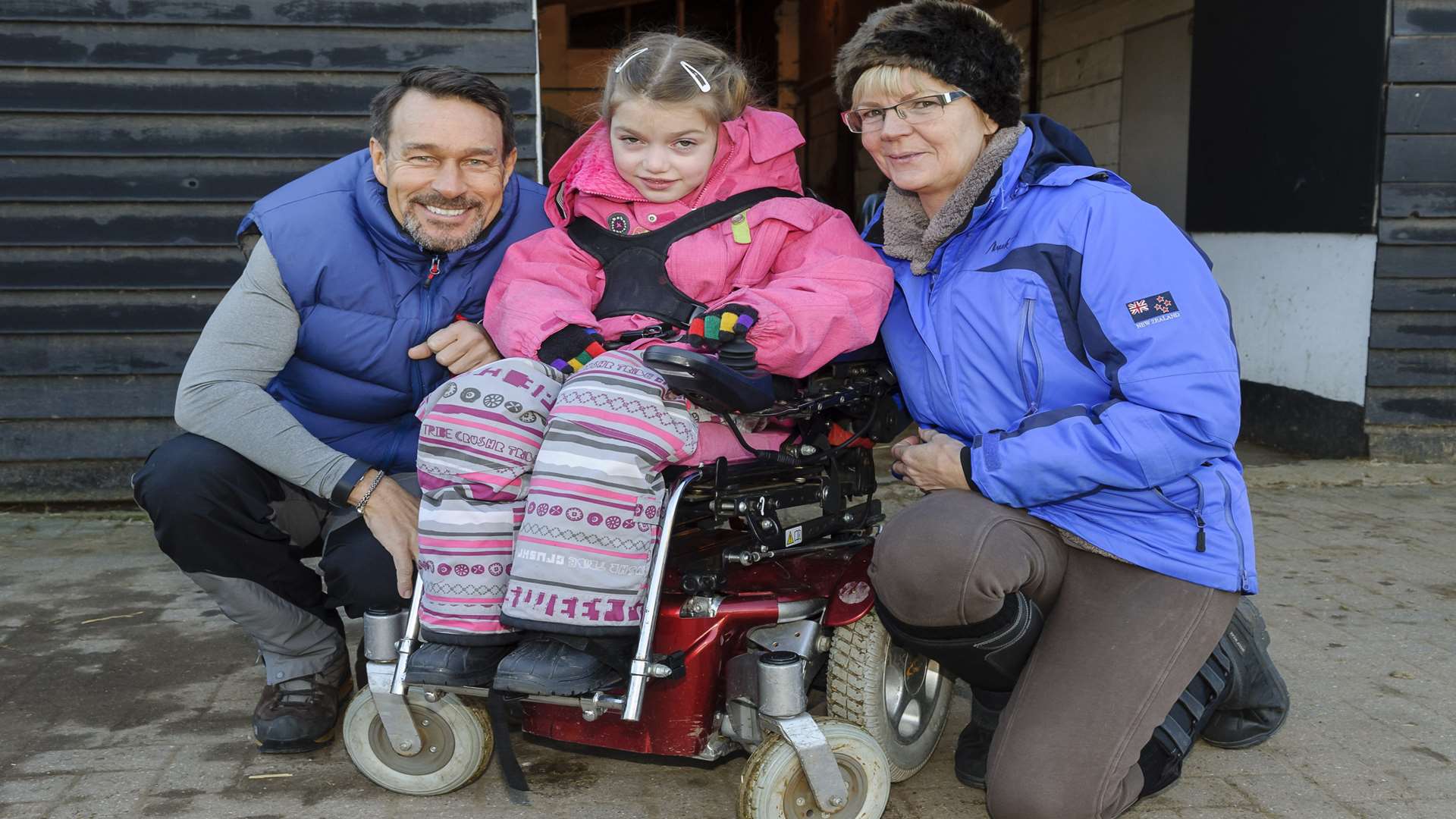 Mark Owen, left, and Kerrie Owen with Issy