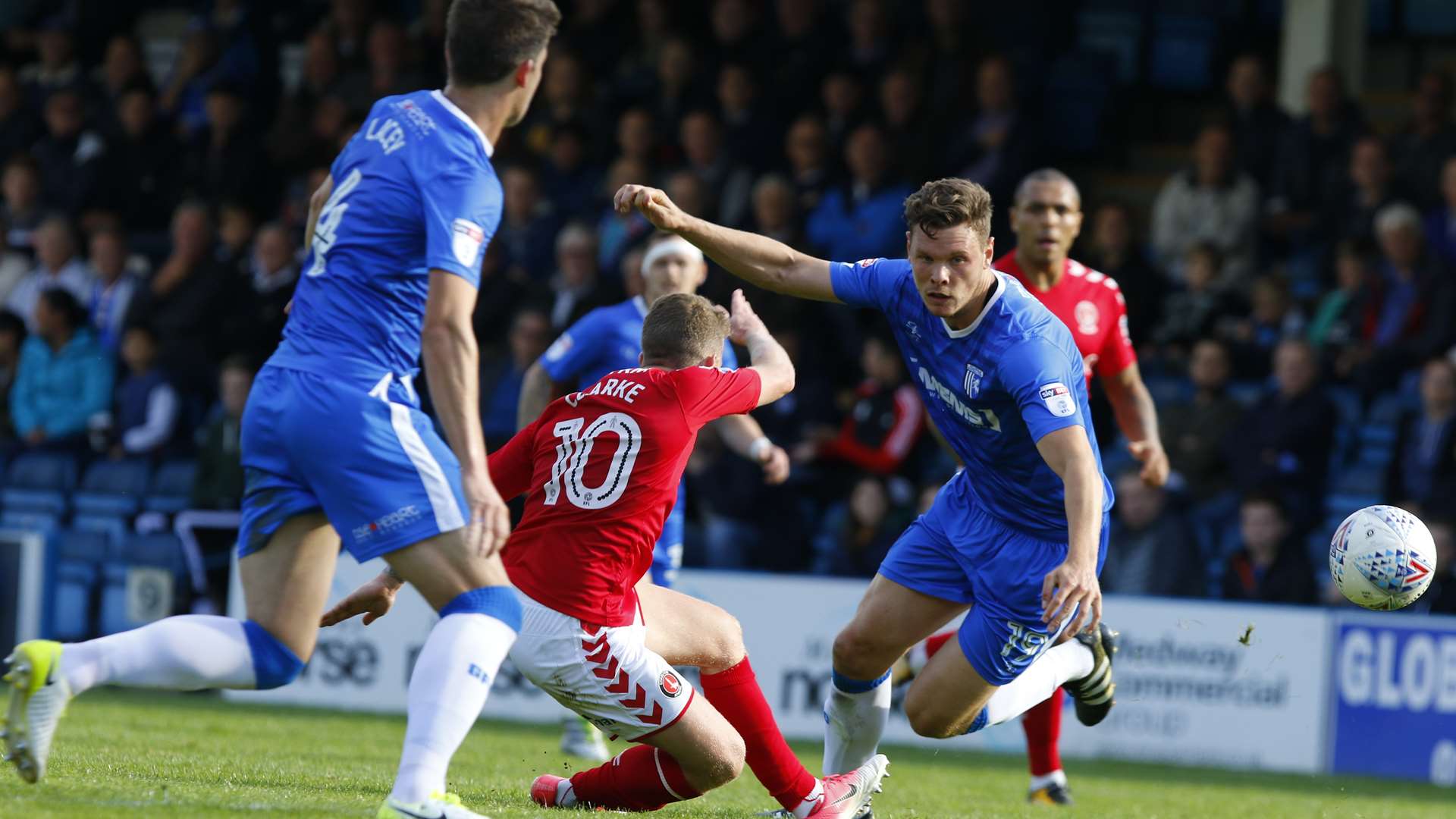 Ben Nugent and Charlton's Billy Clarke clash Picture: Andy Jones