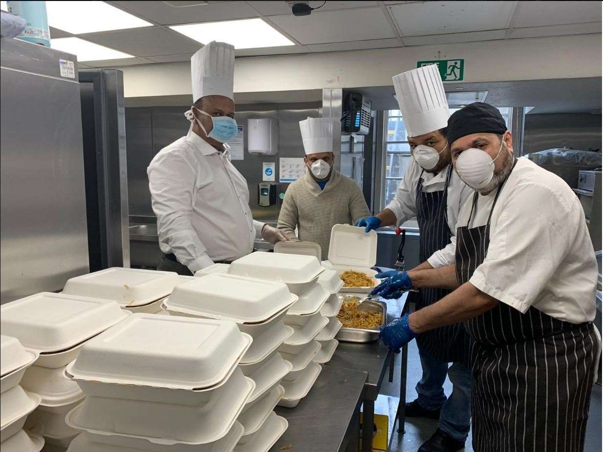 Head chef Kingsley Jesudasan with his volunteer team