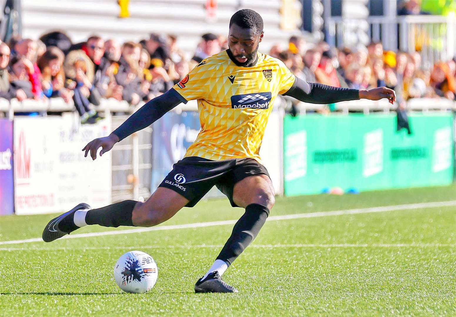 Maidstone defender Paul Appiah in possession against Weston. Picture: Helen Cooper