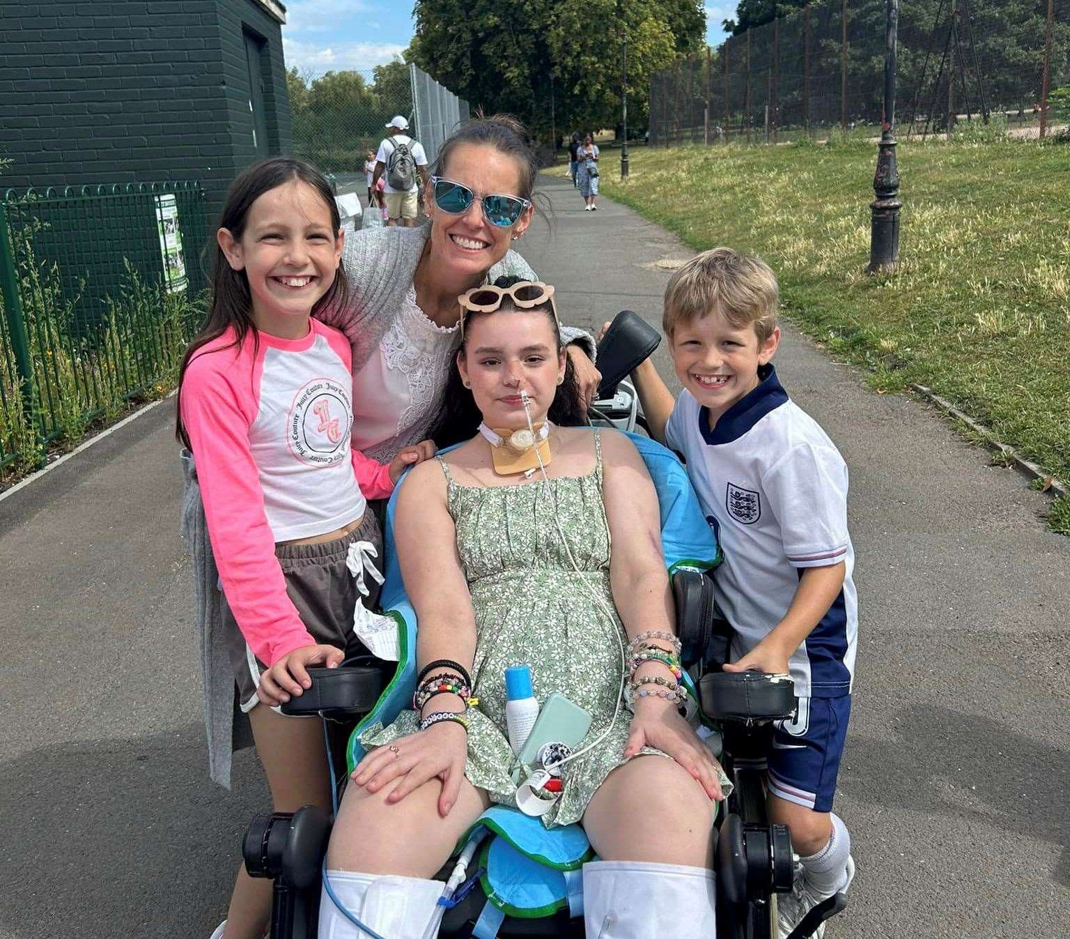 Grace Tutt managed to get out of the hospital for a trip to the park. Picture: Andrew Tutt