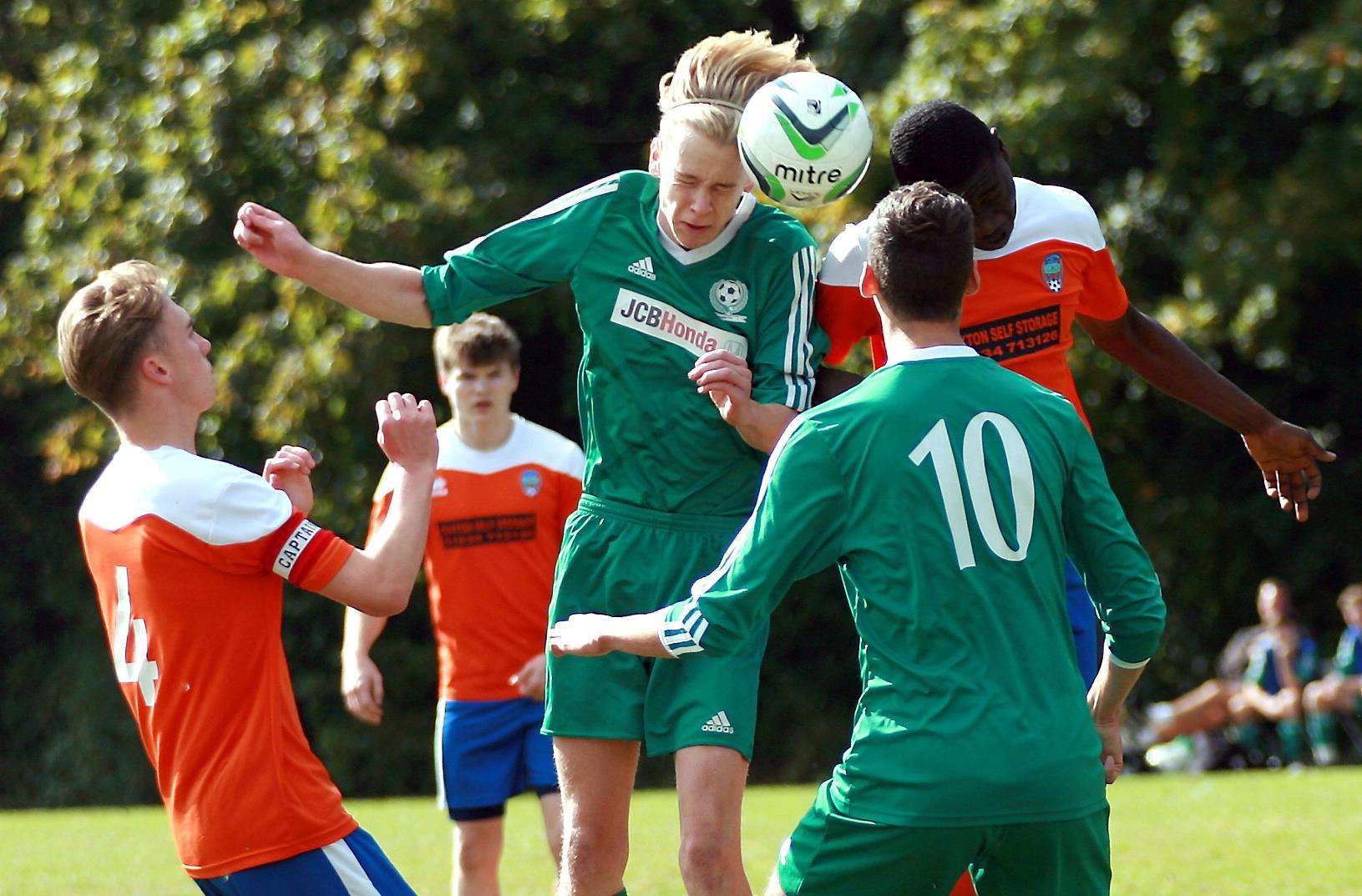 Eagles White (green) take on Cuxton 91 in Under-18 Division 1 Picture: Phil Lee