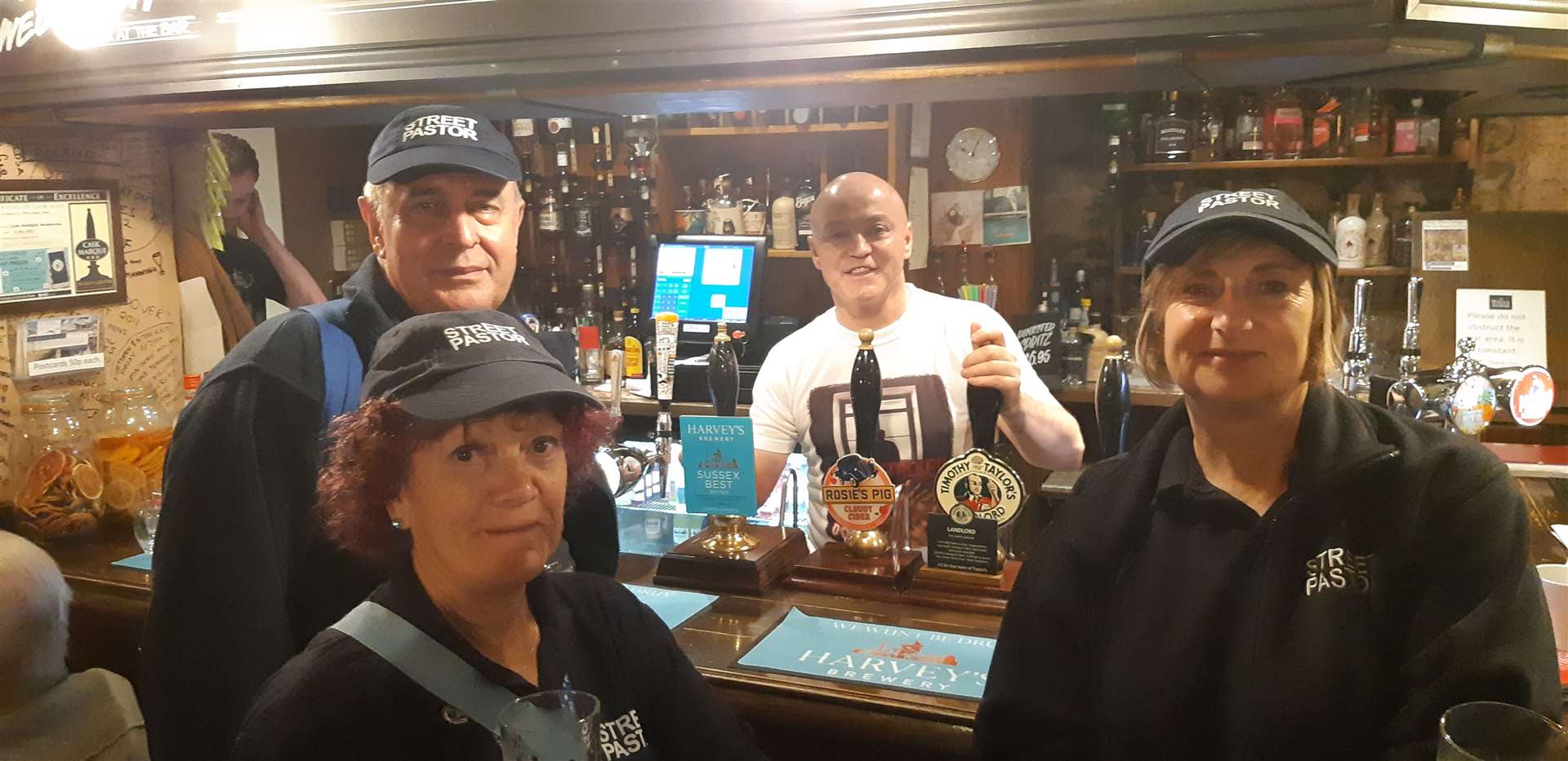 Street pastors look in on the White Horse in Dover, pictured with co-landlord Stuart Fox