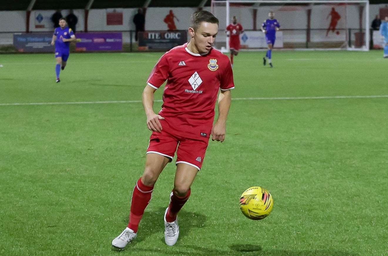 Josh Oliver in action for Whitstable Town against Hollands & Blair Picture: Les Biggs