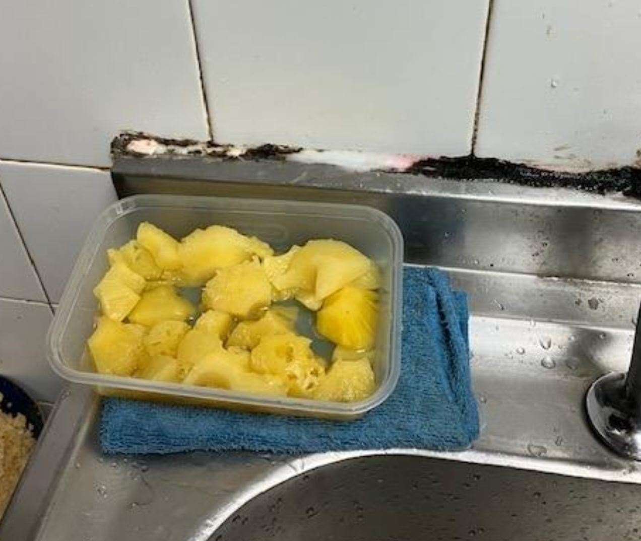 Mould and dirt on the seals of a sink in the kitchen