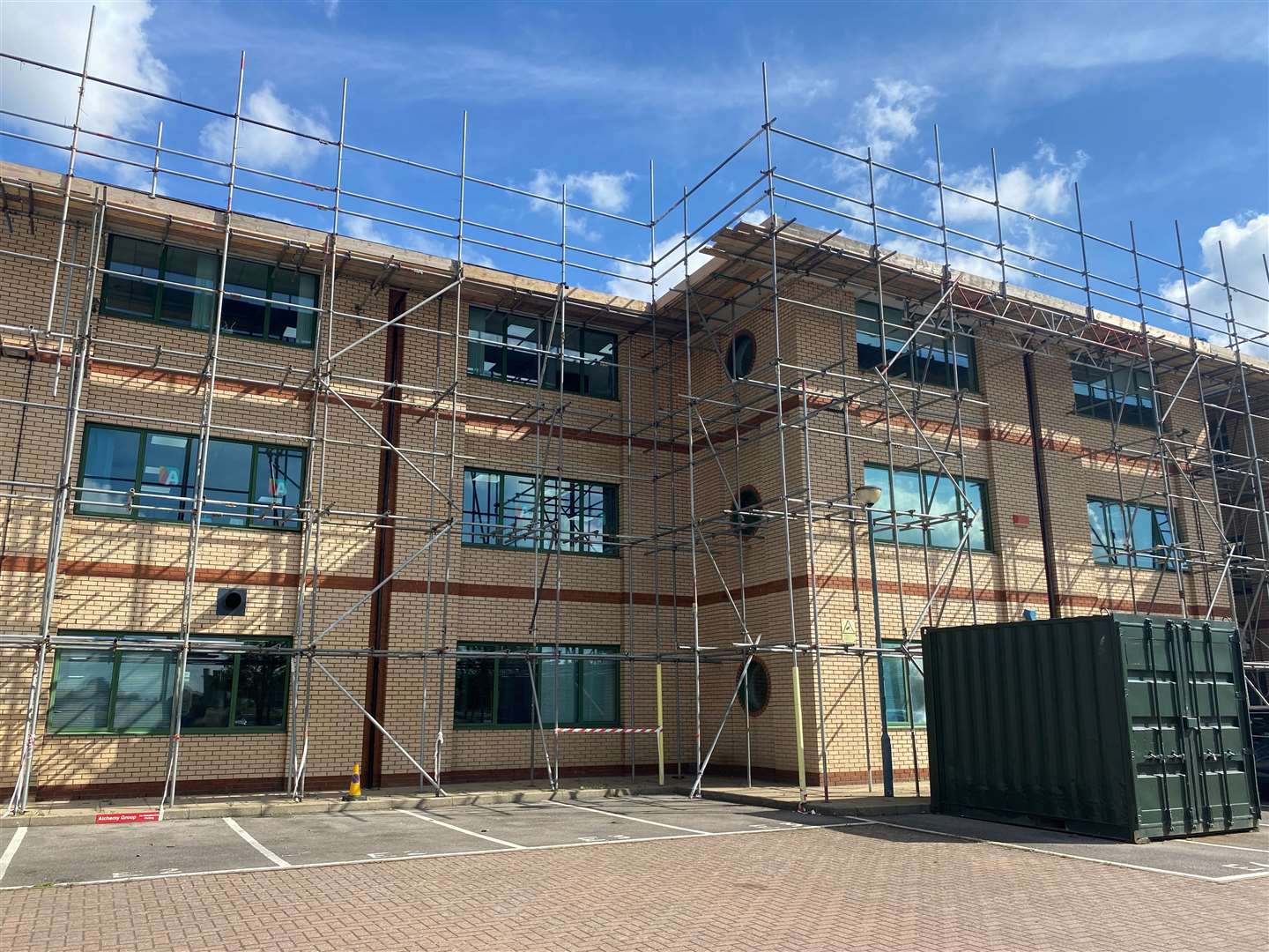 Around 100 new roof tiles on the building had been smashed