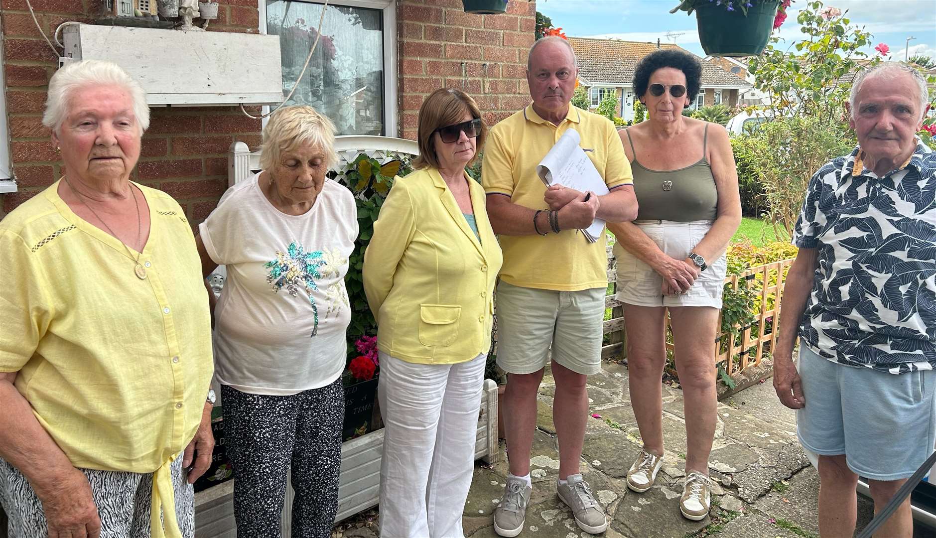 From left to right, Betty Patey, Della Wood, Caroline Hendley, Philip Hendley, Karen Kemp and Ron Wood are all concerned over the homes on The Sands estate