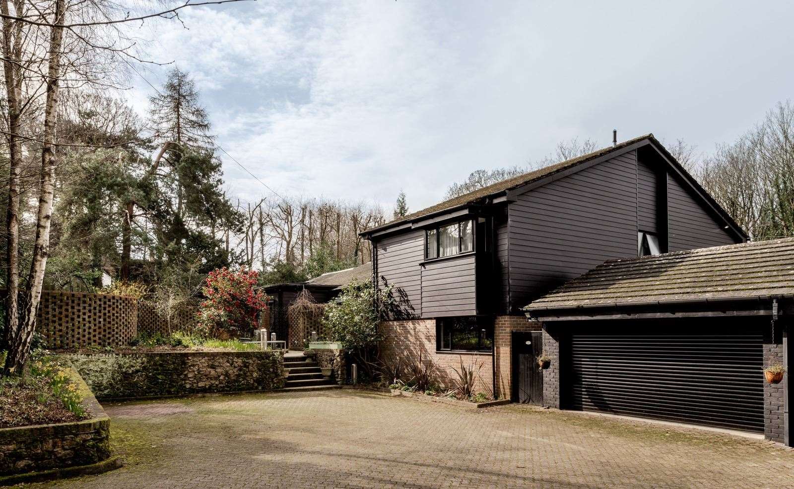 There is an electric charging point inside the double garage. Picture: The Modern House