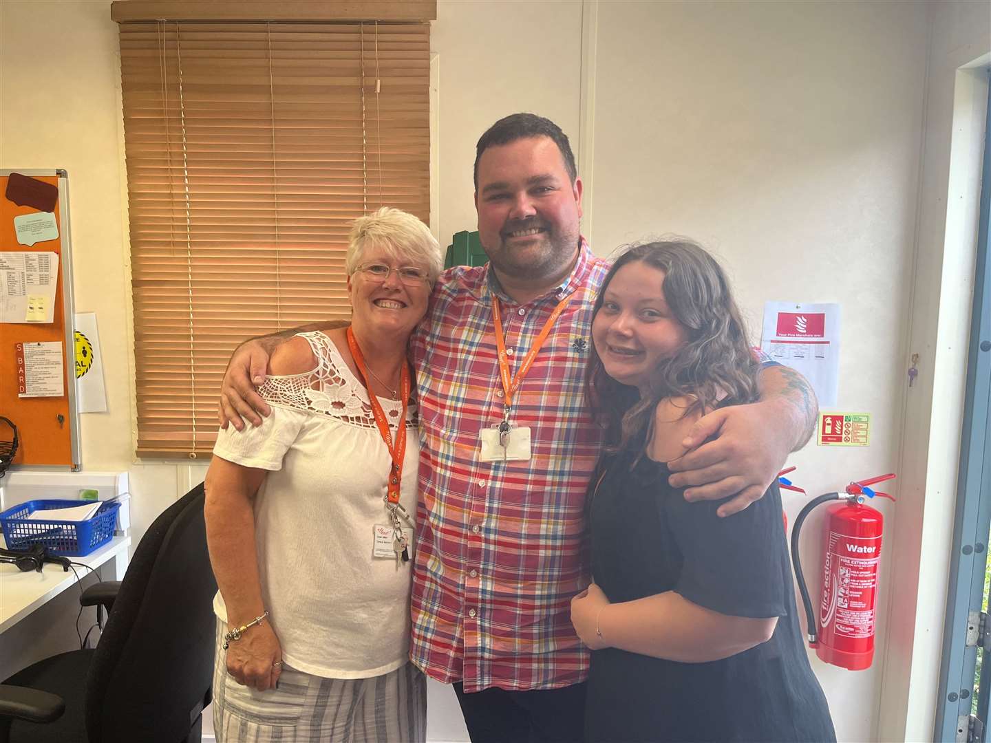 Sam Fry, an administrative assistant at ellenor Hospice, with his work colleagues