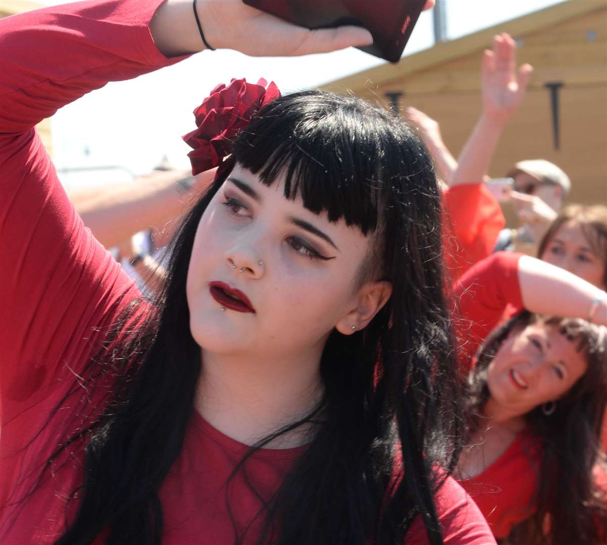 Attendees are invited to wear red dresses for the performance. Pictured: Tyra Fleure at last year's event. Picture: Chris Davey