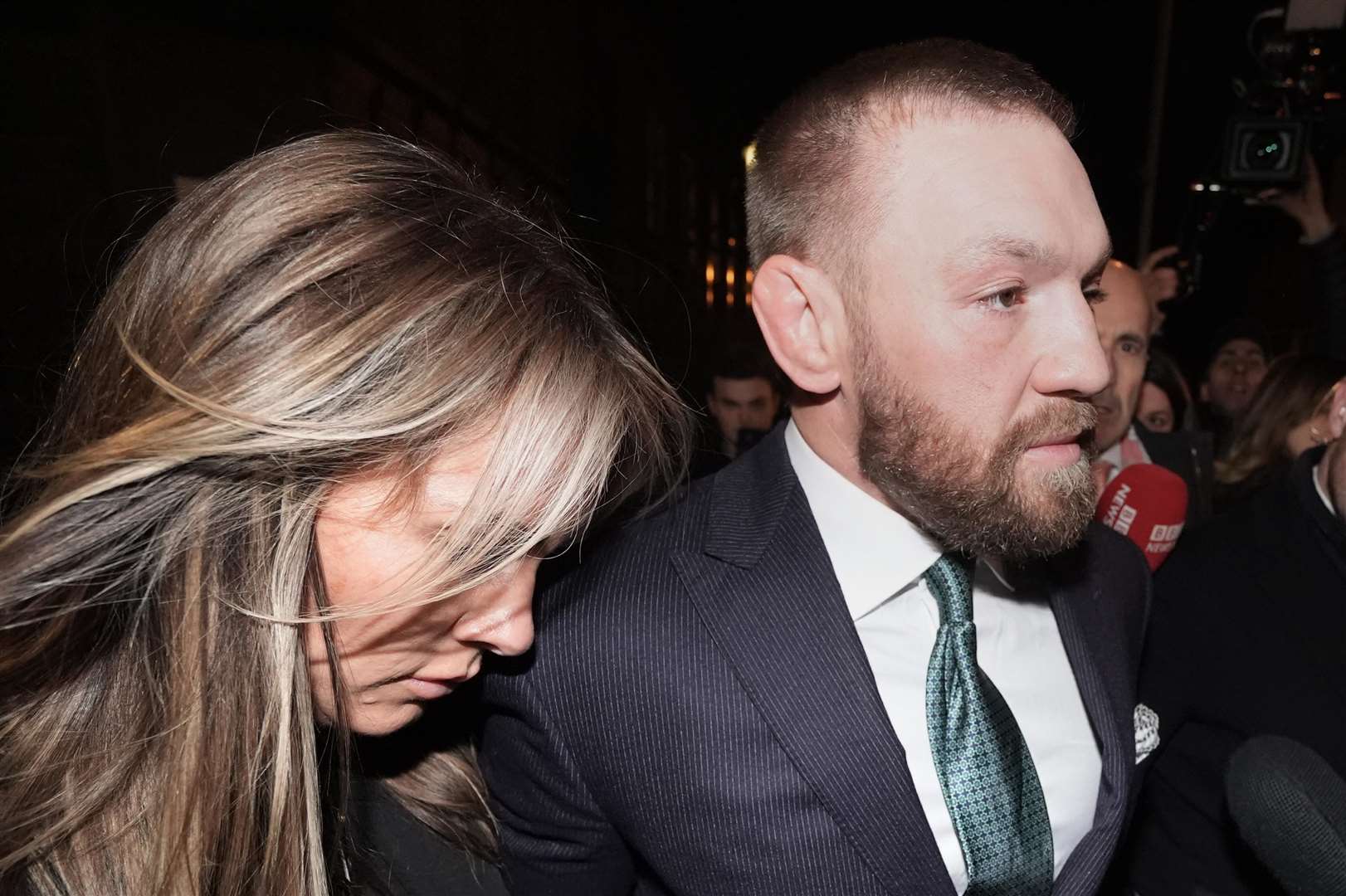 Mixed martial arts fighter Conor McGregor was accompanied in court on Friday by his partner Dee Devlin (Brian Lawless/PA)