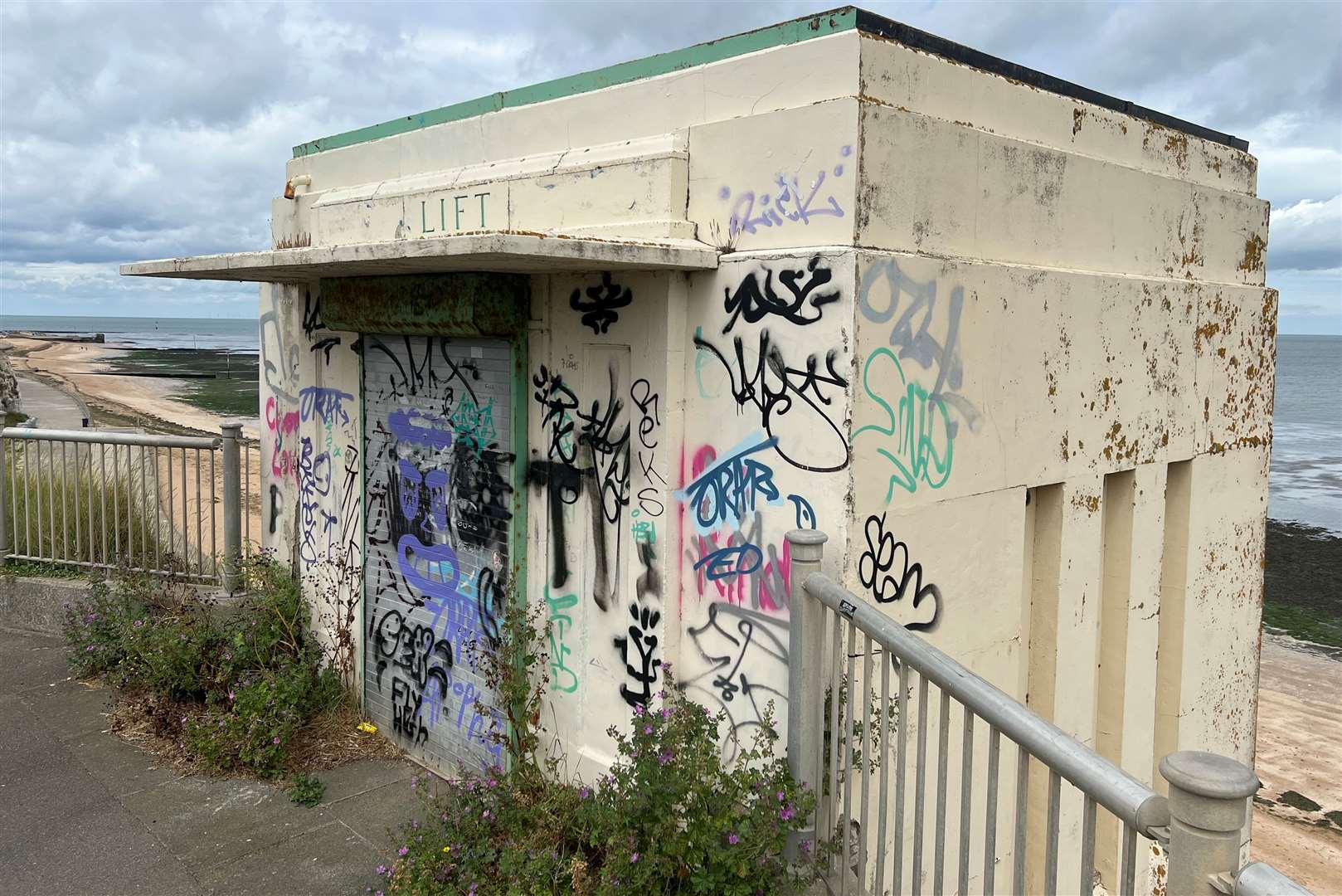 The cliff-top access to the art deco lift at Walpole Bay - long since left for weeds and graffiti