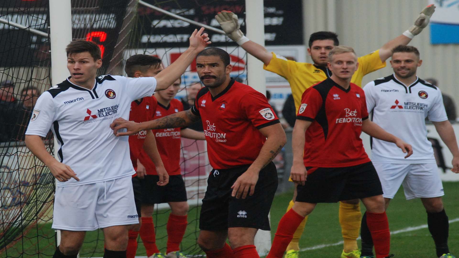 Charlie Sheringham marked by former Fleet defender Ian Simpemba Picture: Paul Jarvis