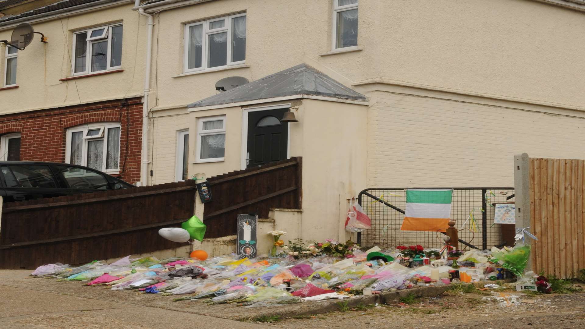 Flowers and tributes left near the scene where Mr Tierney was found.