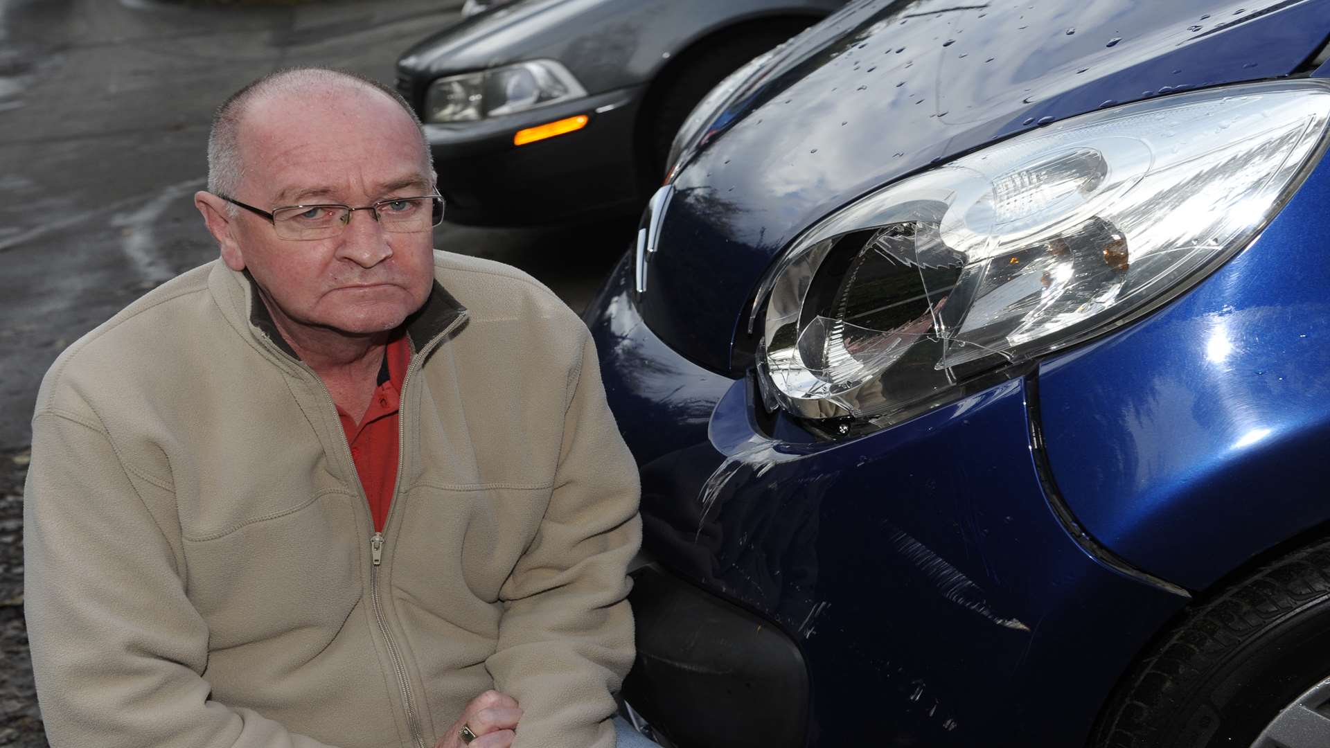 Malcolm Foster with his damaged car