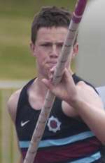 Scott Huggins set a new pole vault record