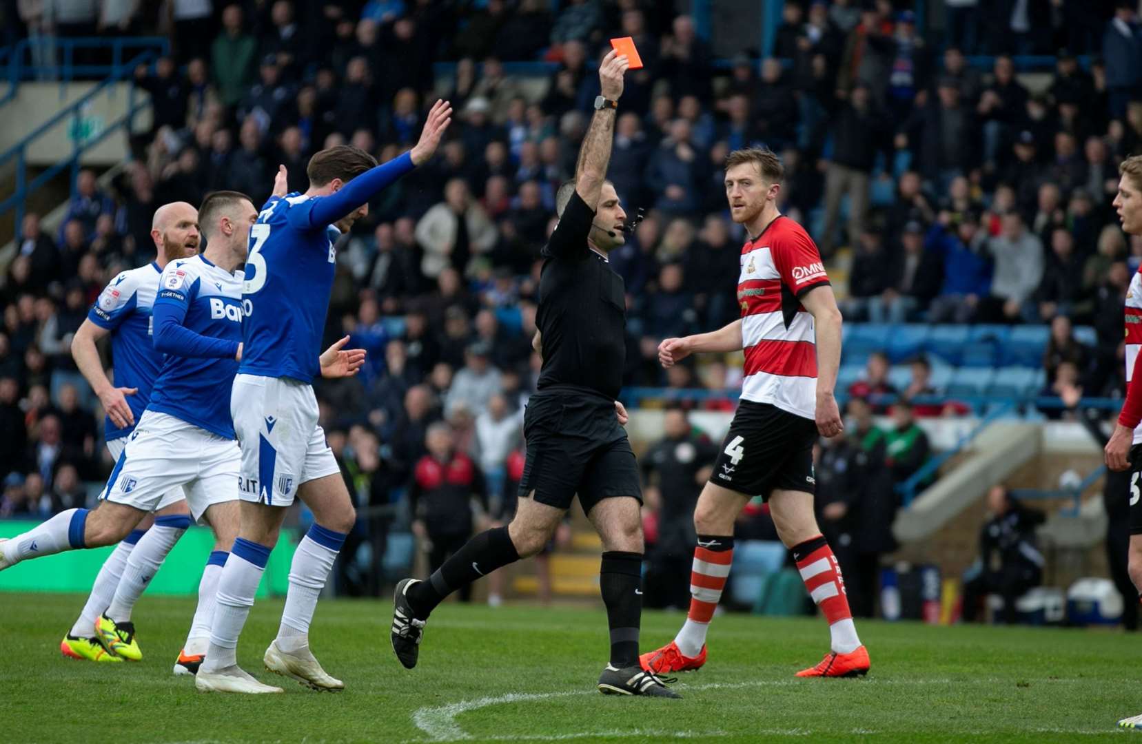 The referee sends off the Doncaster goalkeeper early in the second half Picture: @Julian_KPI