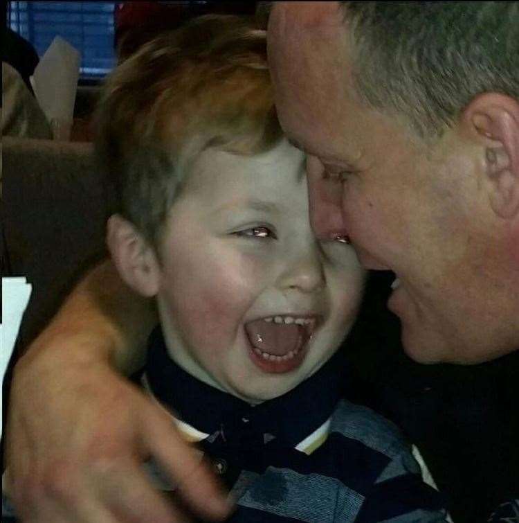 Ollie Jones with his dad Lloyd, who has now found help from Helen Whately MP