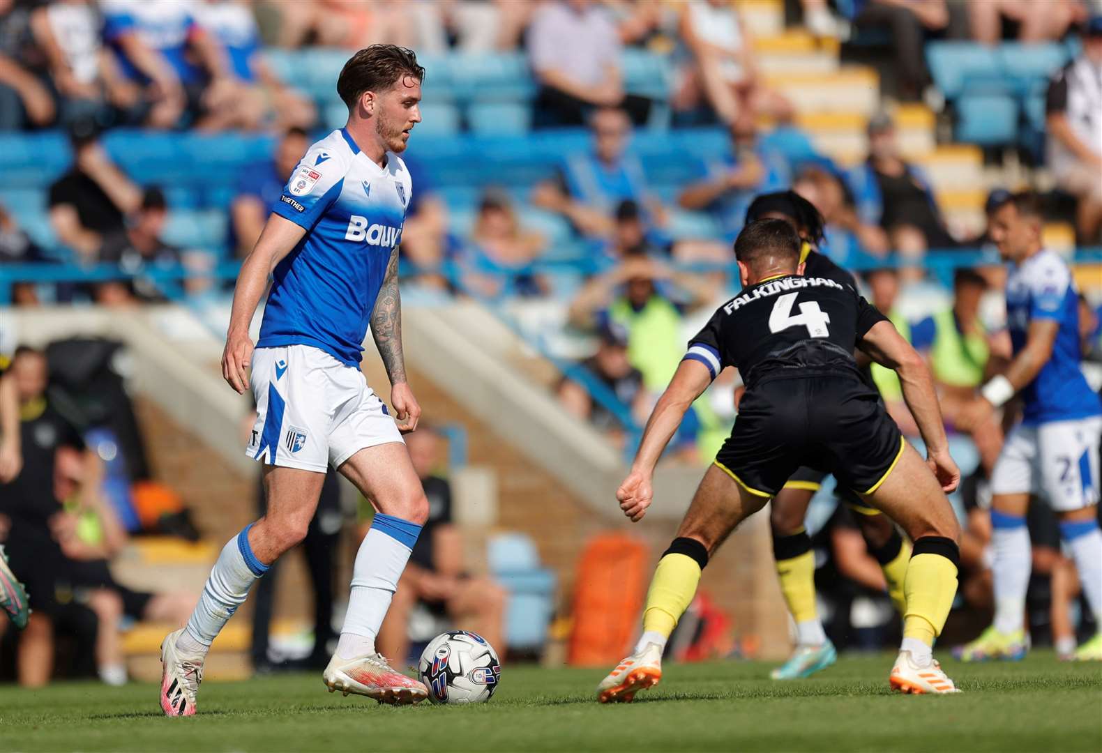 Connor Mahoney with two Harrogate players for company Picture: @Julian_KPI