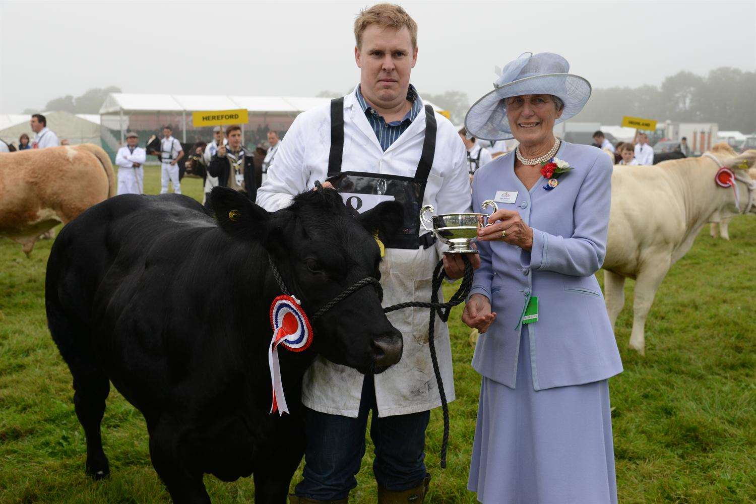 Anthony Pride from Maidstone receiving his award from Mary Anthony for his British Blue