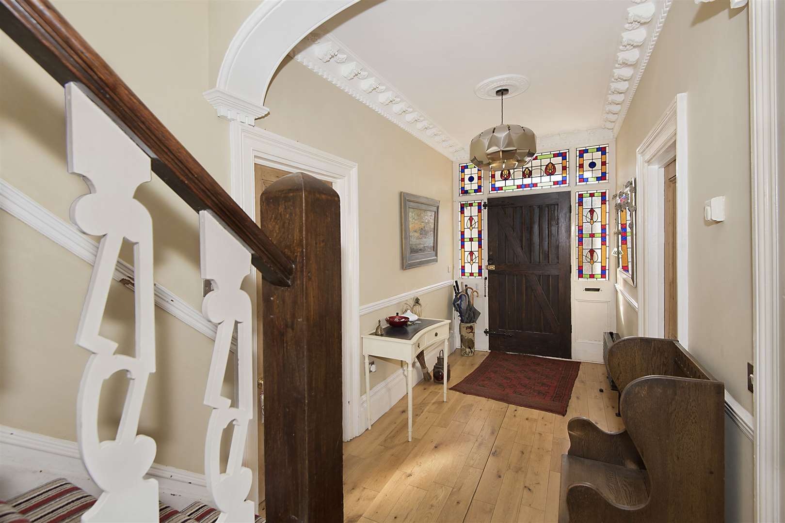 An original oak pew is in the hall