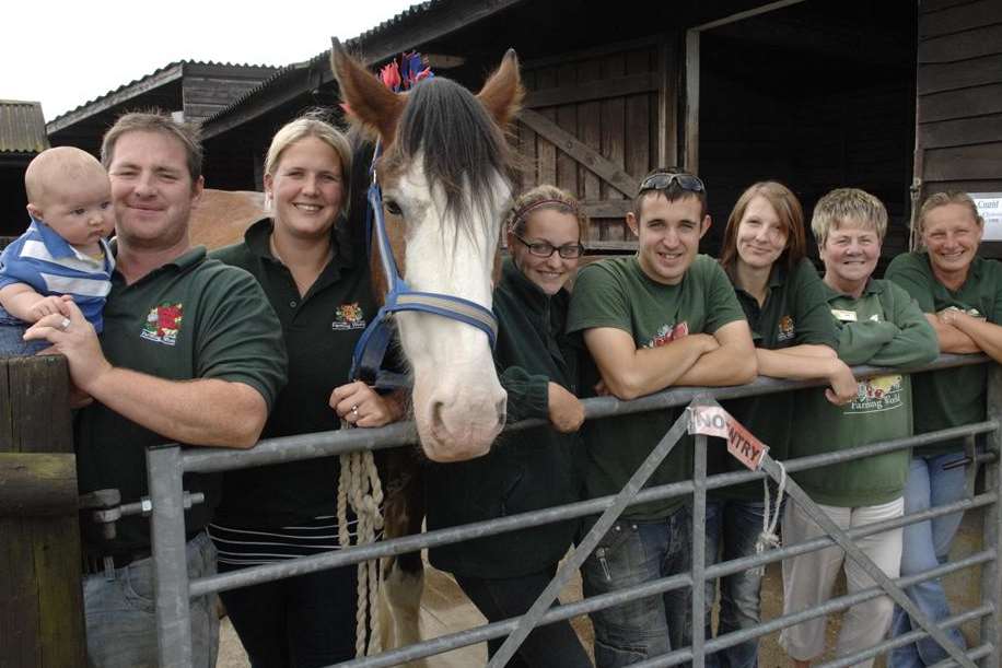 A happier time for staff at Farming World, including Jack Ayling, fourth from right, who lost his job when the landowner decided not to reopen the attraction