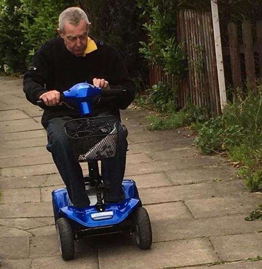 Norris Baxter, 76, on his mobility scooter