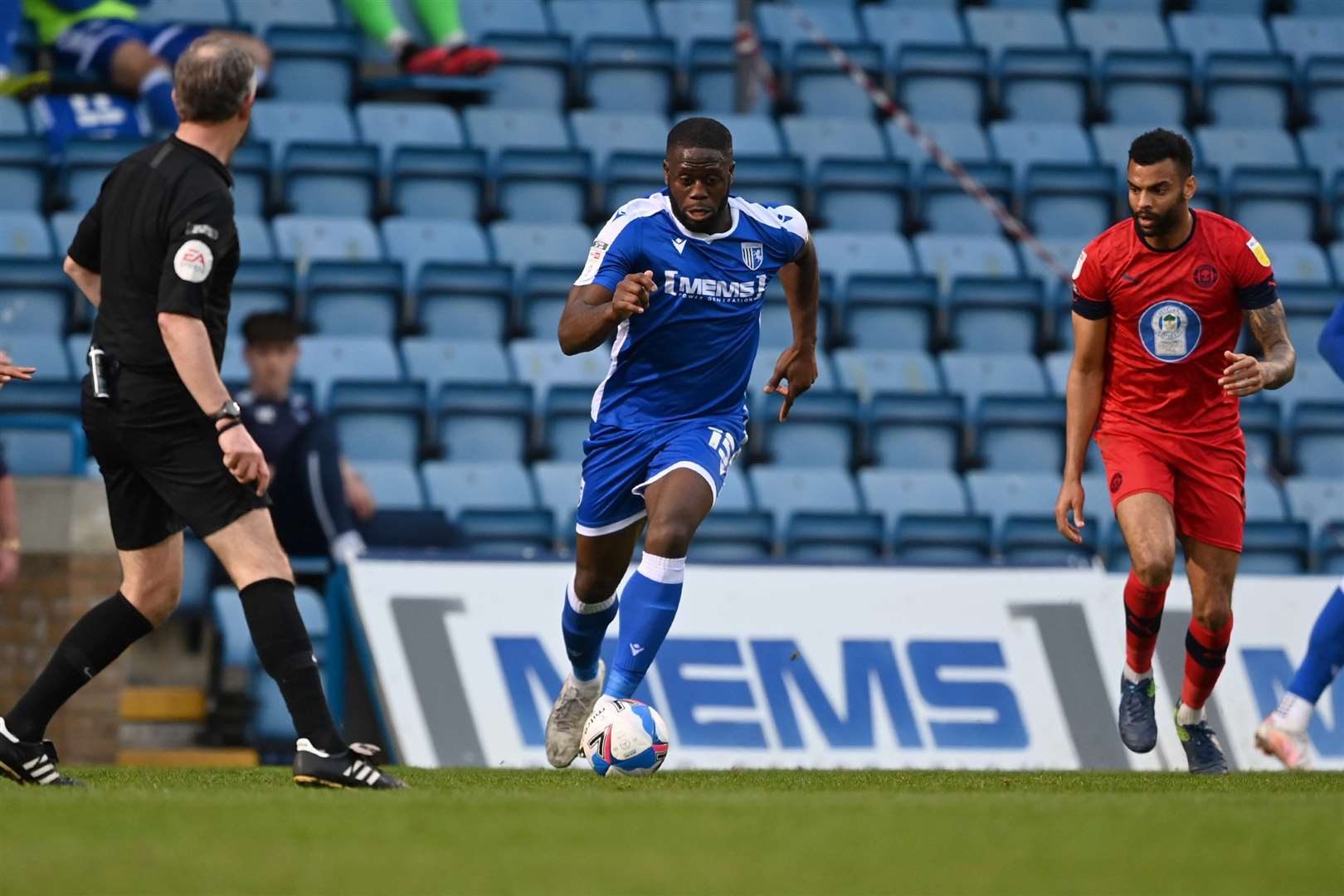 Gills striker John Akinde advances against Wigan. Picture: Keith Gillard