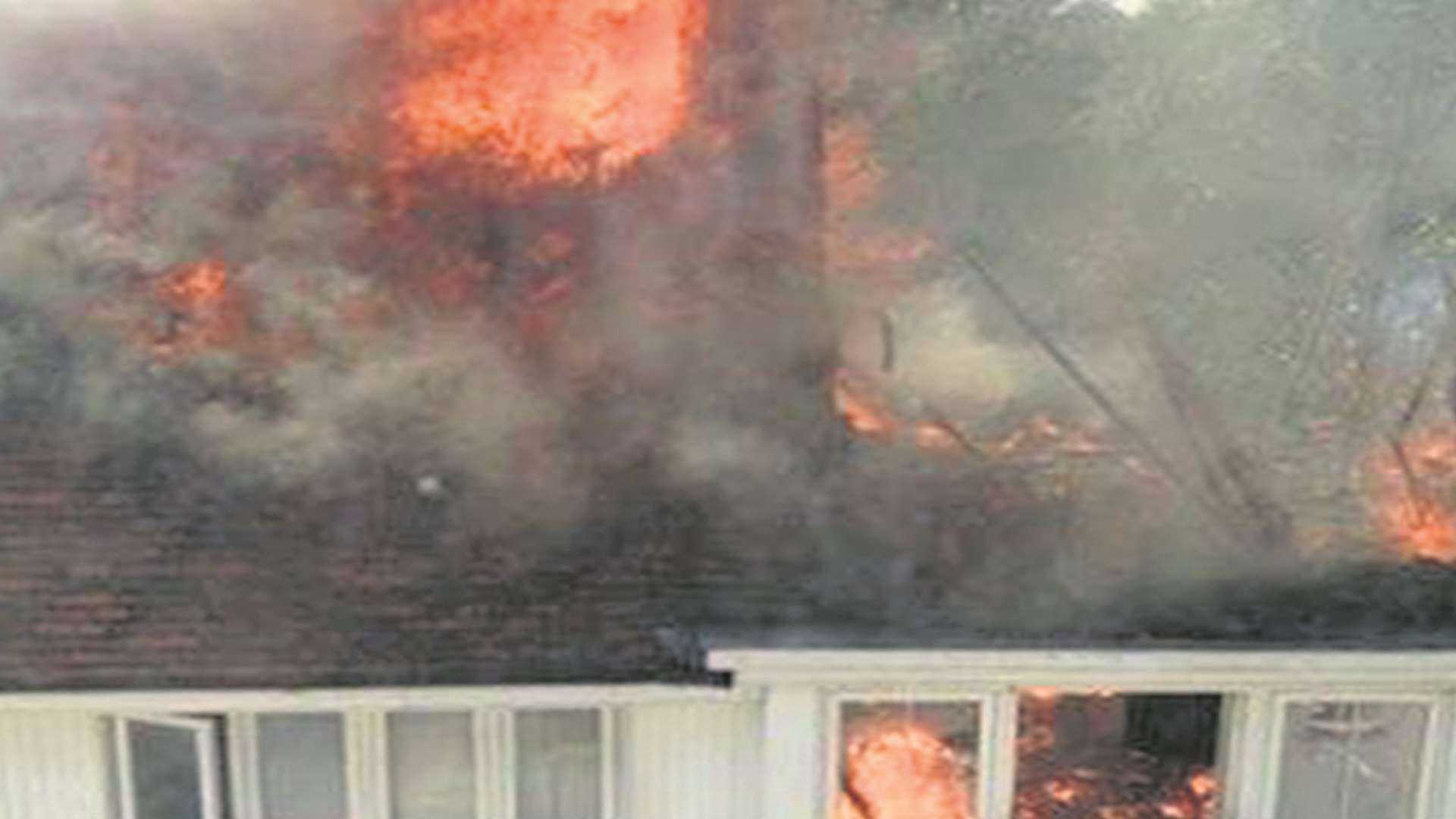 Fire rips through the roof of the flats