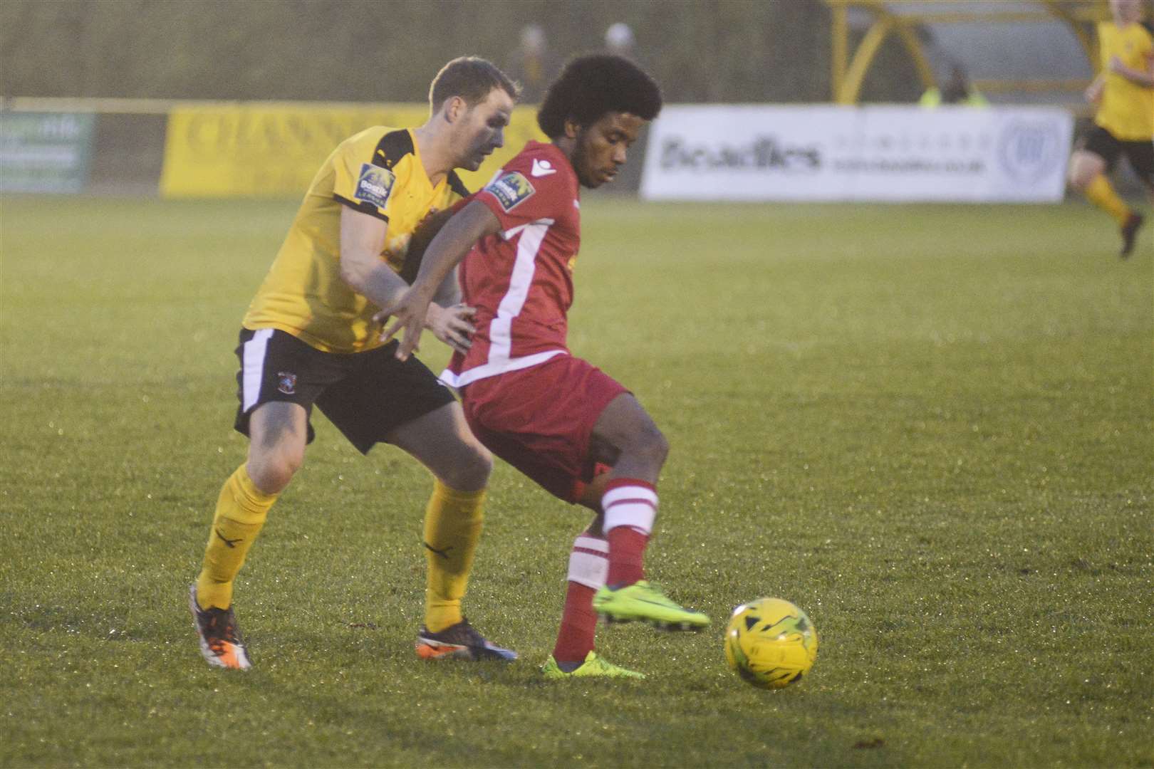 Phil Starkey tries to regain possession during his time at Folkestone Invicta. Picture: Paul Amos