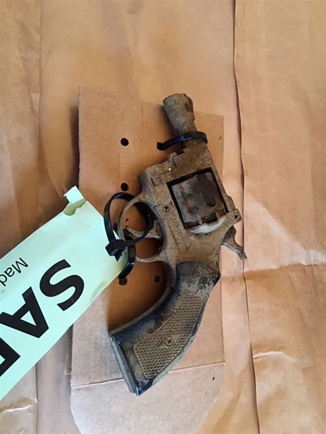 A handgun found in woodland near Warkton, Northamptonshire, which was uncovered during the search for Sarah Benford (Northamptonshire Police/PA)